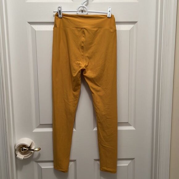 Ladies yellow one size LulaRoe leggings. - Picture 3 of 6